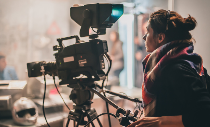 Camera operator working on creative project
